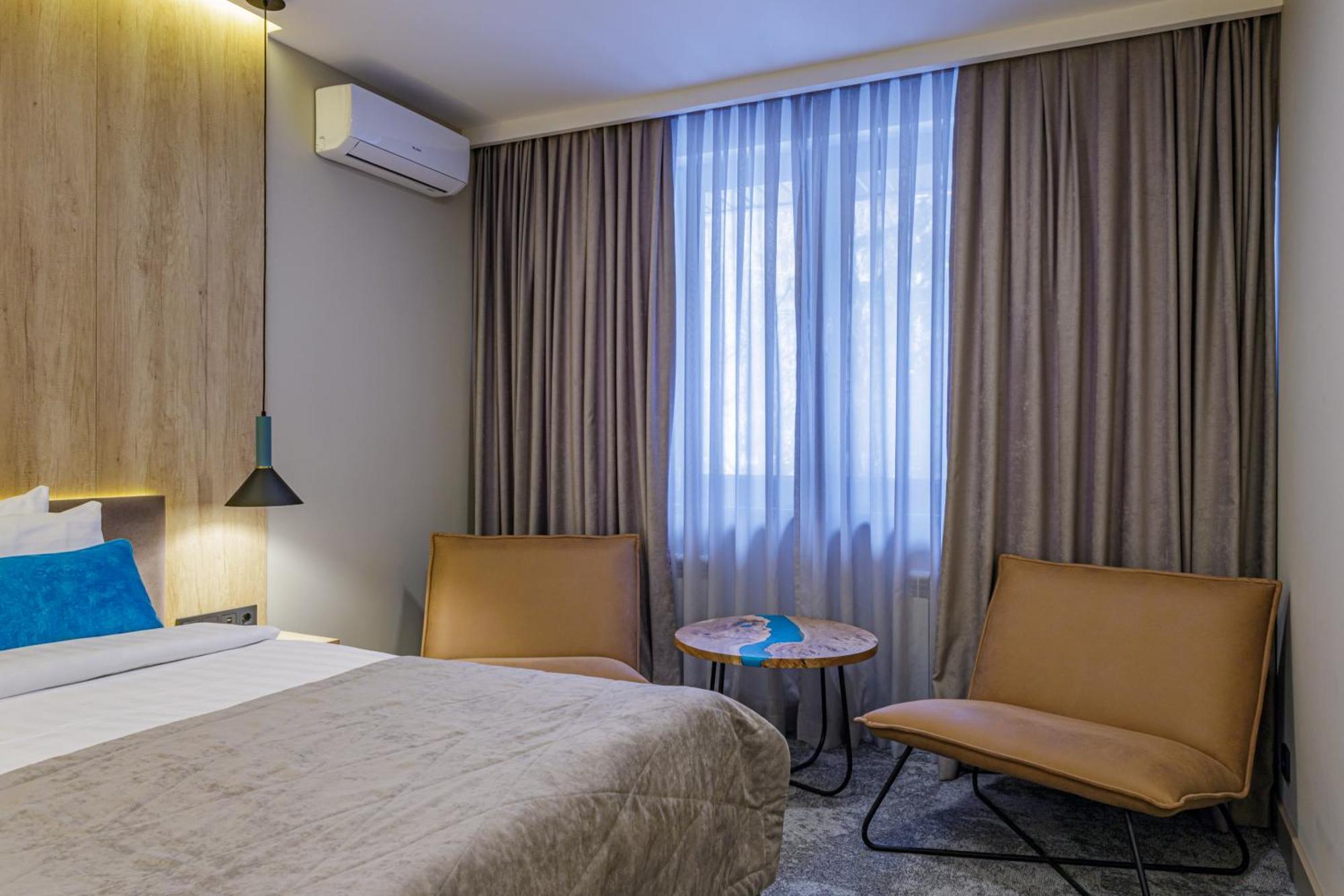 Тау-House Hotel Kok-Shoky ภายนอก รูปภาพ